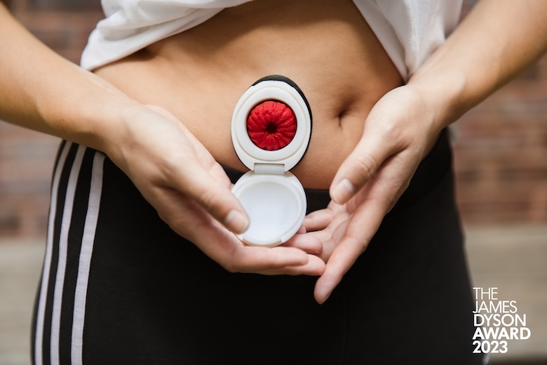 An original OriVa prototype attached to a person with the lid open showing the flexible wafer inside