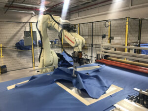 Kawasaki Robotic PPE manufacturing cell